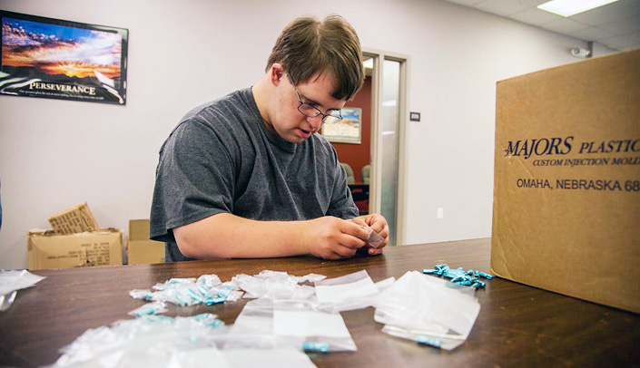Sean Smith, an adult with Down syndrome who participates in supported employment, is one of the people featured in the