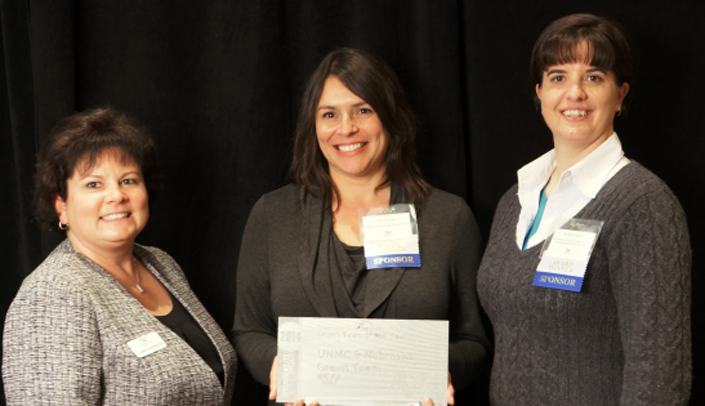 From left, Carrie Hakenkamp of WasteCap Nebraska, Julie Sommer, LiveGreen volunteer, and Melanie Stewart, UNMC sustainability manager.