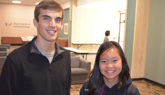 Mentor Michael Price, left, with High School Alliance student Emma Frerichs, at the recent Lunch and Learn.
