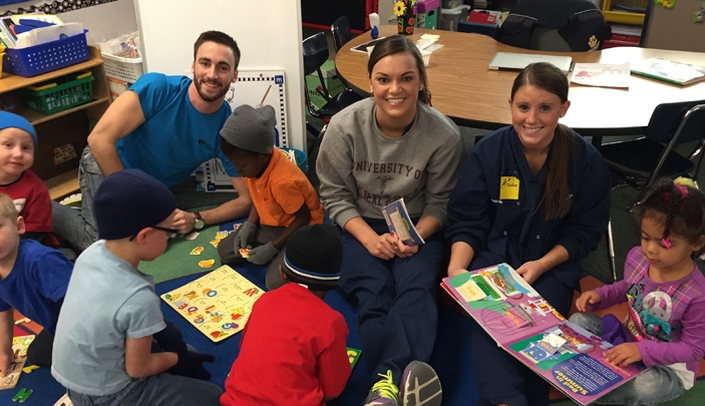 The School of Allied Health Professions' Radiation Science Technology Education (RSTE) students read to pre-kindergarten students.