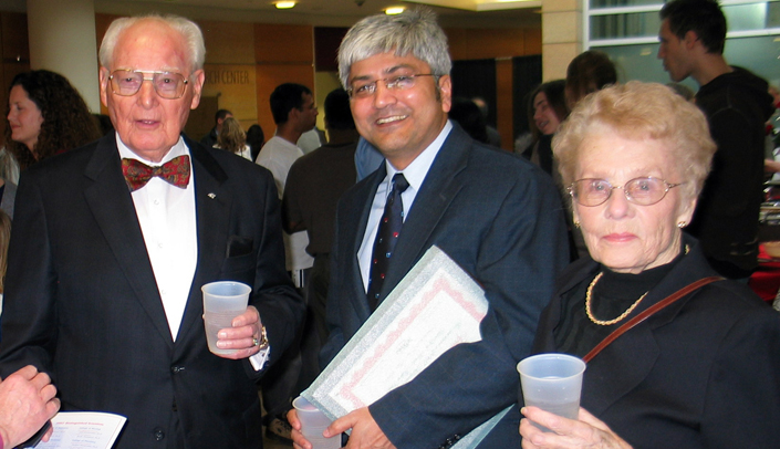 Iqbal Ahmad, Ph.D. (center) with Roy and Mary Pearson.