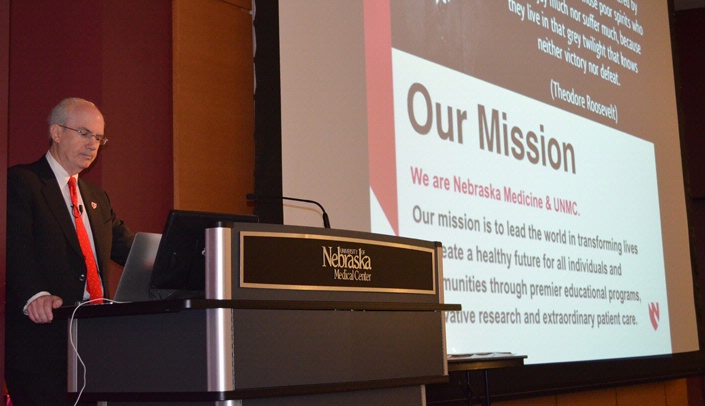 UNMC Chancellor Jeffrey P. Gold, M.D., discusses the new mission statement at Thursday's annual faculty meeting.