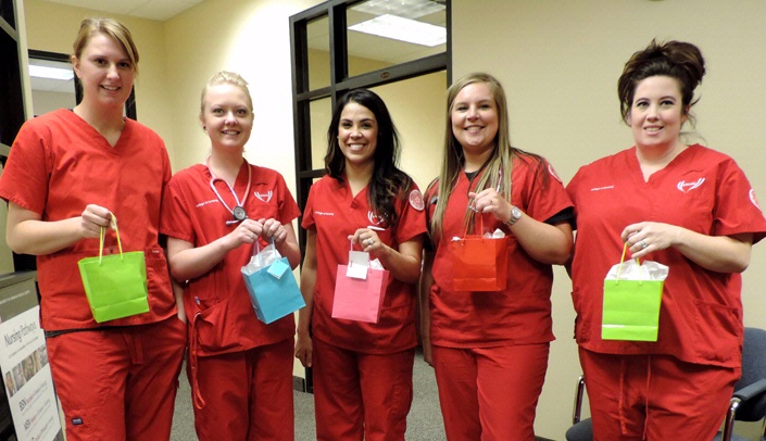 Students from the College of Nursing in Scottsbluff display the May baskets they won as part of Spirit Week at UNMC. The campus also had cookies for all students, faculty and staff.