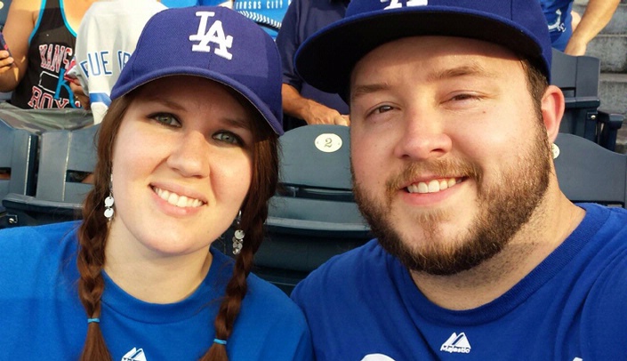 Hannah Stanzel, left, with her husband, Joe, watching the Dodgers play the Royals.