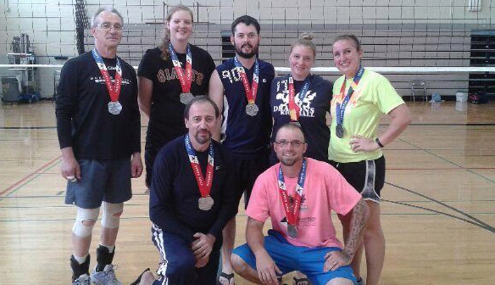 UNMC's silver medal-winning volleyball team included (left to right in the back row) Arcady Ginzberg, Erin Deboldt, Andy Miller, Traci Leggitt and Mikayla Chalupa; (front row) Lenny Raksin and Nathan Chalpa.