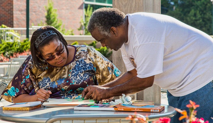 Instructor Ron Sykes, at right, will lead the art classes on campus this fall.