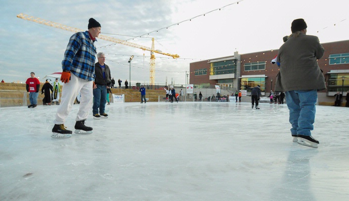 Ted Wuebben (blue plaid shirt) skates at 2015 UNMC Skate-a-thon for Parkinson's.