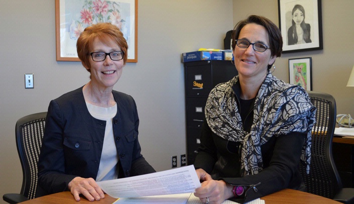 Evaluators Linda Comfort, left, and Rose Zweiback