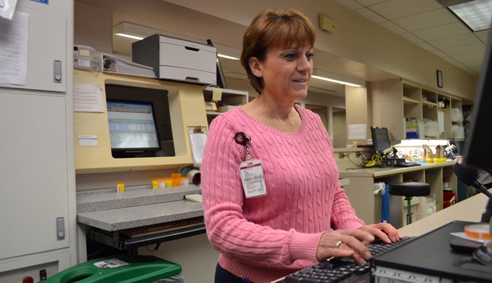 Val Lawton, pharmacy technician at Nebraska Medicine's outpatient pharmacy at the Durham Outpatient Center, has undergone NE-CPhT certification training, and will be among dozens in the program's inaugural class to receive their certifications at an April 21 event at UNMC.