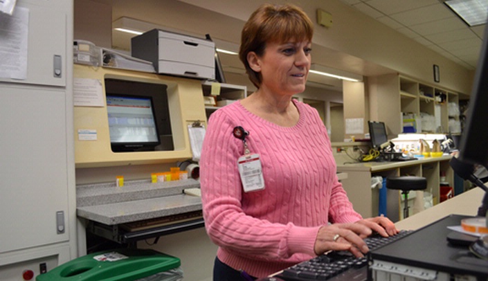 Val Lawton, pharmacy technician at Nebraska Medicine's outpatient pharmacy at the Durham Outpatient Center, has undergone NE-CPhT certification training, and will be among dozens in the program's inaugural class to receive their certifications at an April 21 event at UNMC.