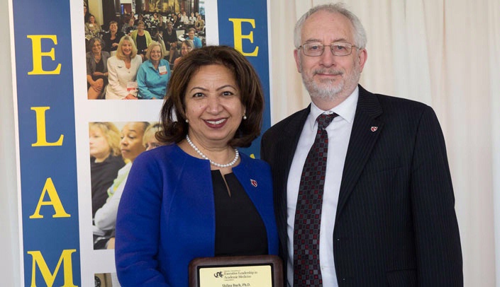 Shilpa Buch, Ph.D., and Brad Britigan, M.D., dean of the UNMC College of Medicine