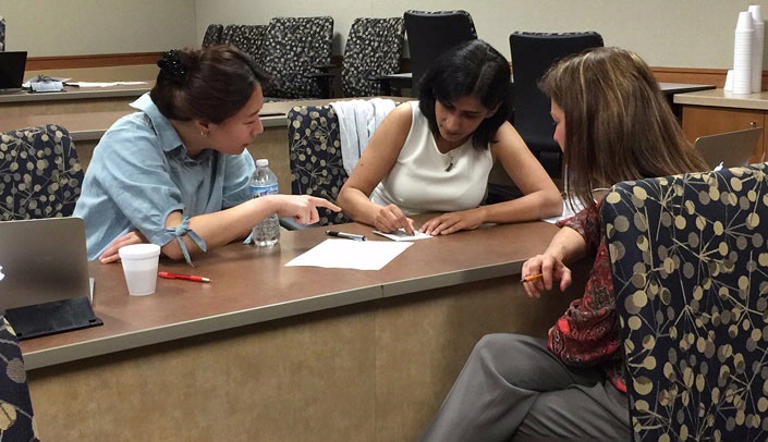 From left, Jungyoon Kim, Veenu Minhas and Kim Haynes-Henson participate in the Performance Improvement in Teaching Series.