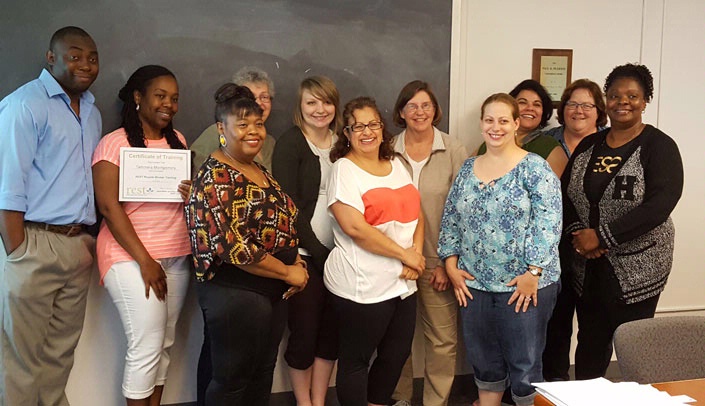 The Munroe-Meyer Institute's latest group of REST (Respite Education and Support Tools) certified trainees celebrate completing their training on June 4. The training, led by Ellen Bennett, respite coordinator and Janet Miller, respite assistant, is part of MMI's efforts to address the need for respite caregivers in the state of Nebraska. The next REST training will be held in September. People interested in learning more about or attending the training should contact Kim Falk at 402-559-4951.