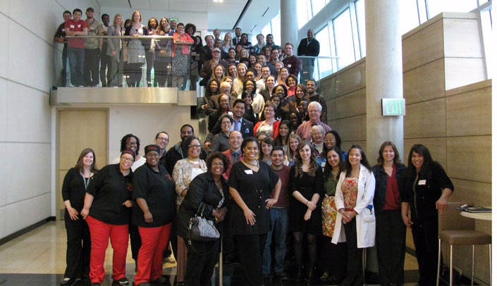 Renaisa Anthony, M.D., center, and the Race, Inclusion, Diversity & Equity (R.I.D.E.) Initiative team.