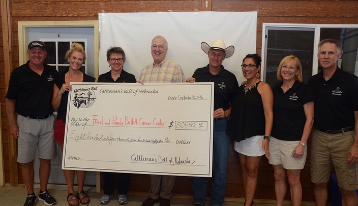 This year's Cattlemen's Ball of Nebraska, which took place at the Lienetics Ranch near Princeton, Neb., raised $805,000 to go toward the Fred & Pamela Buffett Cancer Center. Left to right are Cattlemen's Ball Chairmen Will and Tory Kerns and Jane Green, Dr. Ken Cowan, 2016 Cattlemen's Ball hosts Trevor and Torri Lienemann, and Chairmen DaNay and Tim Kalkowski.