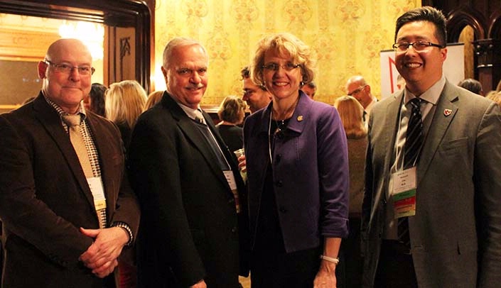 From left, Greg Karst, Ph.D., executive associate dean, College of Allied Health Professions, Joe Evans, Ph.D., BHECN associate clinical director, State Sen. Sue Crawford, and Howard Liu, M.D., BHECN director, at the sixth annual BHECN mentorship dinner.