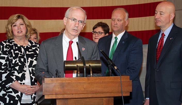 From left, U.S. Attorney Deb Gilg, UNMC Chancellor Jeffrey P. Gold, M.D., Attorney General Doug Peterson and Gov. Pete Ricketts (photo courtesy of the League of Municipalities)