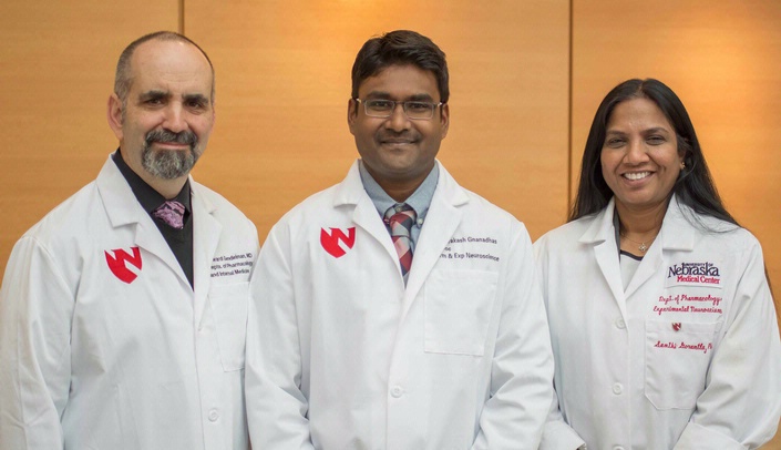 The three lead researchers from the UNMC Department of Pharmacology/Experimental Neurosciences include (left-right): Howard Gendelman, M.D., professor and chair, Divya Prakash Gnanadhas, Ph.D., post-doctoral research associate, and Santhi Gorantla, Ph.D., associate professor.