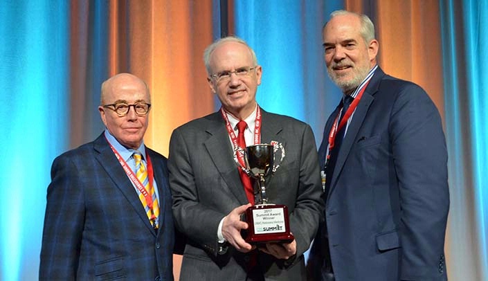 From left, Jerry Slusky, founder of the CRE Summit, UNMC Chancellor Jeffrey P. Gold, M.D., and David Brown, president and CEO of the Greater Omaha Chamber of Commerce
