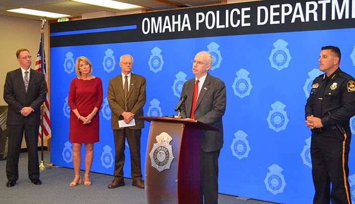 From left, city prosecutor Matt Kuhse, Omaha Mayor Jean Stothert, Steve Hinrichs, M.D., chair of pathology and microbiology, UNMC Chancellor Jeffrey P. Gold, M.D., and Omaha Police Chief Todd Schmaderer.