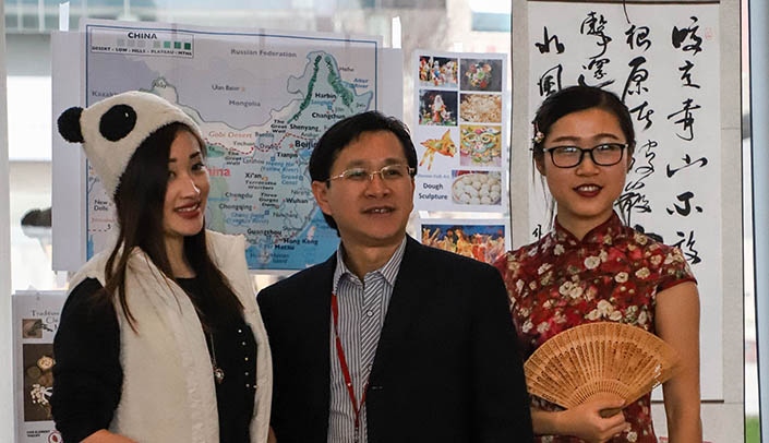 Chinese graduate students celebrate their culture during the Cultural Diversity Fair held in the Durham Research Center Atrium.