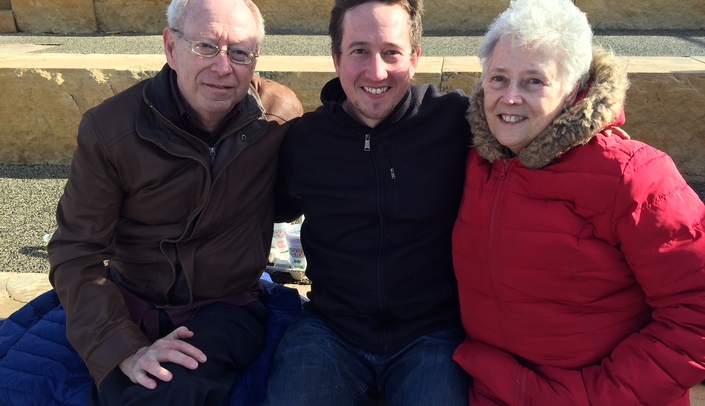 Ryan Cary (center) is flanked by his father, Stephen, and his mother, Jeanne, after completing the UNMC Skate-a-thon for Parkinson's. Cary recruited 42 skaters for the event and brought in $2,600. His LeaseTeam, Inc. competed in the Rock the Clock category, which required the team to have at least one skater on the ice throughout the 24-hour event. Stephen Cary, a retired property manager for NP Dodge, has had Parkinson's disease for the past 12 years.