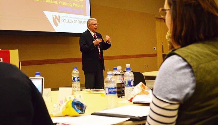 Charles Krobot, Pharm.D., speaks at a continuing education event for pharmacy technicians.