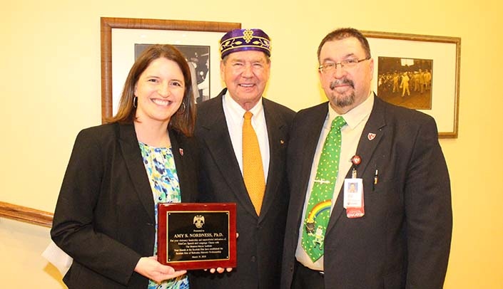From left, Amy Nordness, Ph.D., Charles Sederstrom, Jr., and MMI Director Karoly Mirnics, M.D., Ph.D.