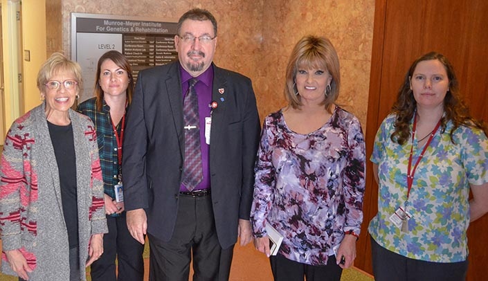 From left, Mary Pachman, Autism Care for Toddlers Clinic; Tara Harper, UCEDD; MMI Director Karoly Mirnics, M.D., Ph.D.; Kristy Horeis, medical genetics; and Sara Baker, PT sensory-motor learning lab. Not pictured: Kim Wiechman, Human Genetics Laboratory.