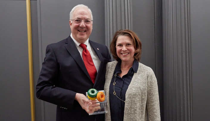 Ken Cowan, M.D., Ph.D., and Alison Freifeld, M.D., holding their Lifesavers Award from the Nebraska Coalition for Lifesaving Cures.