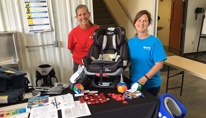 From left, MMI physical therapists Marne Iwand and Amy Beyersdorf at Fire and Safety Day