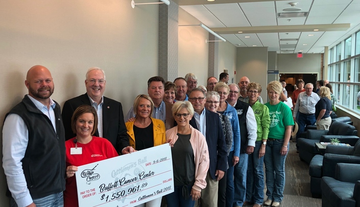 Ken Cowan, M.D., Ph.D. (third from left), director of the Fred & Pamela Buffett Cancer Center, went to Hebron, Neb., on Sept. 6 to receive a proceeds check of more than $1.55 million from the planning committee for this year's Cattlemen's Ball of Nebraska. (Photo courtesy of Nancy McGill)