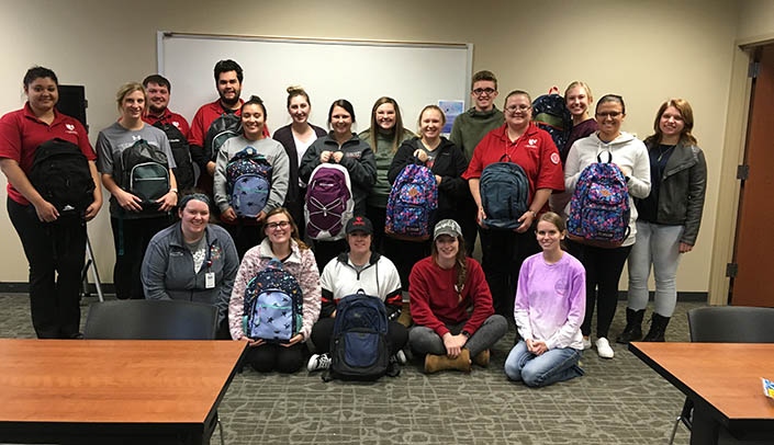Nursing students from the UNMC College of Nursing Northern Division in Norfolk recently donated school supplies to the Orphan Grain Train.