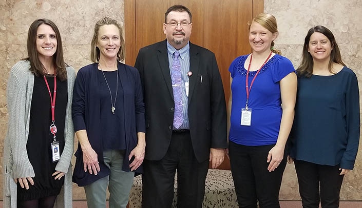 From left, October's honorees, pictured with director Karoly Mirnics, M.D., Ph.D., at center, are Kathryn Peterson, Ph.D., Cathy Jansen, Annie Woodruff-Jameson and Pamela Althof. Peggy Whitsell is not pictured.