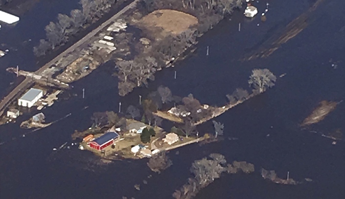 Some of the flood devastation in Nebraska is obvious from this aerial photograph of farm property between Fremont and Omaha. (Photo by Zach Duysen)