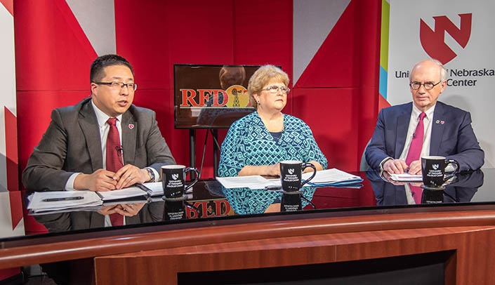 From left, Howard Liu, M.D., Robin Tutor Marcom, Ed.D., and UNMC Chancellor Jeffrey P. Gold, M.D.