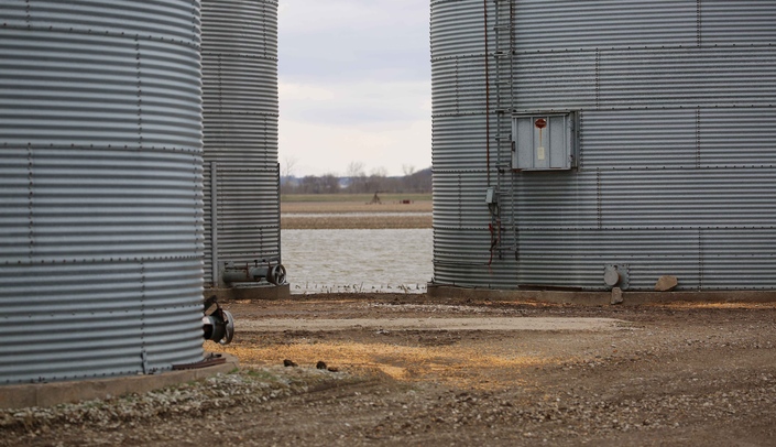 Grain bins impacted by the recent flooding in the Midwest can pose obvious and unseen dangers. (Photo by Risto Rautiainen, Ph.D., director of the Department of Environmental, Agricultural & Occupational Health in the UNMC College of Public Health)
