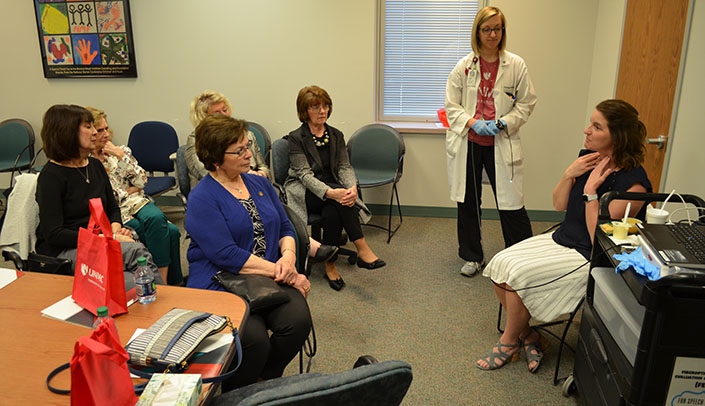 Amy Nordness, Ph.D., far right, discusses the Fiberoptic Endoscopic Evaluation of the Swallow (FEES) technology with members of the Nebraska Legislative League.