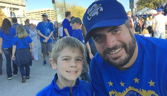 Mark Law, right, and his son, Zack, enjoy baseball as a family activity during the summer months.