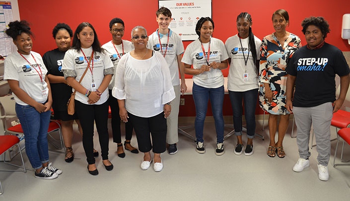 Step-Up interns at UNMC are joined by program coordinator Evelyn Grixby (fifth from left) and Assistant Vice Chancellor for Human Resources Aileen Warren (second from right).