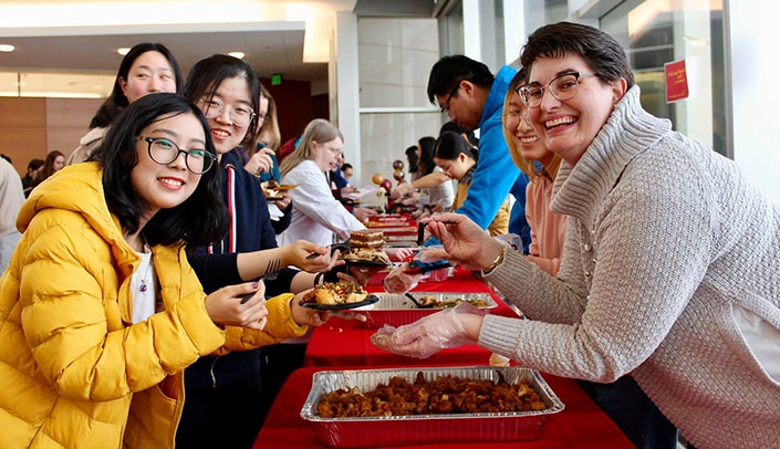 Visitors to the 2019 Chinese Cultural Fair enjoy some food. Food for Friday's event will be provided by Blue and Fly, China Buffet and Asian Market.