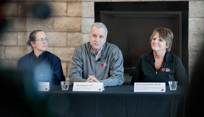 From left, Dana Hall, deputy federal health coordinating officer, Office of the Assistant Secretary for Preparedness and Response; Michael Wadman, M.D., co-medical director of the National Quarantine Unit; and Shelly Schwedhelm, executive director, emergency management and biopreparedness at Nebraska Medicine, speak at a press conference Friday afternoon to discuss the woman moved to the quarantine center. The woman, who tested negative for COVID-19, has returned to Camp Ashland.