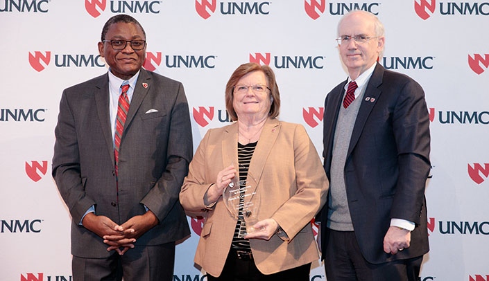 From left, Dele Davies, M.D., vice chancellor for academic affairs, Pamela Carmines, Ph.D., and Chancellor Jeffrey P. Gold, M.D., at the Impact in Education Awards.