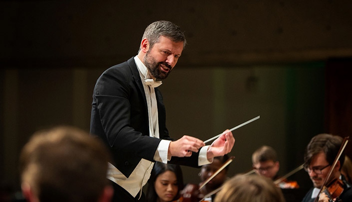 Matthew Brooks, D.M.A., conducting the Heartland Philharmonic Orchestra.