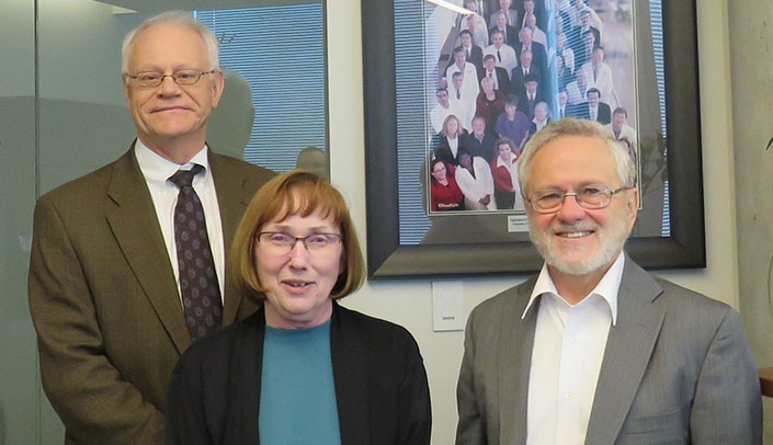 From left, Steve Hinrichs, M.D., chair of the UNMC Department of Pathology and Microbiology, Lora Arnold and Samuel Cohen, M.D., Ph.D., Havlik-Wall Professor of Oncology
