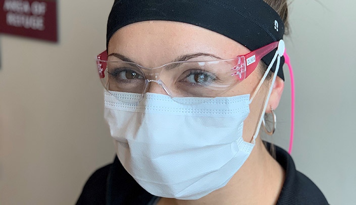 Nurse supervisor Olivia Jensen is seen wearing goggles over her eye glasses. Goggles help protect against bloodborne or chemical exposure and can be used on non-COVID units.