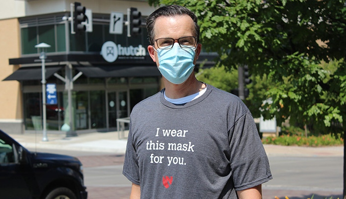 The "I wear this mask for you" T-shirt is available at the Nebraska Medicine Company Store.
