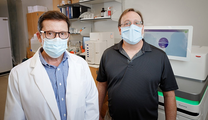 From left, James Eudy, PhD, and research technologist Greg Kubik