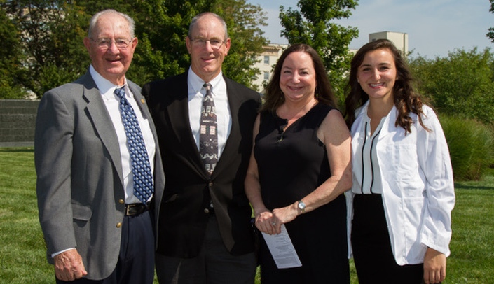 Haley Mathews (far right) with and her physician grandfather, father and mother. When Mathews graduates in May, she will be a third generation physican.