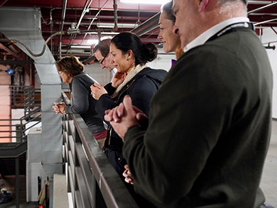 The UNMC team observes the arrival of Americans from China.